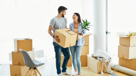 Young couple moving into a new home