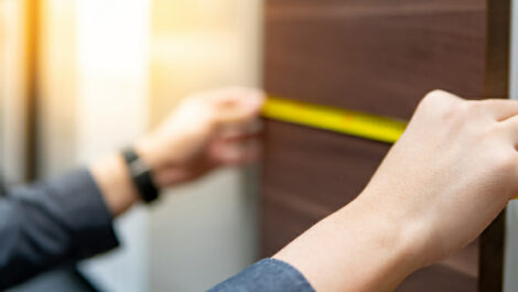 Man measuring a surface