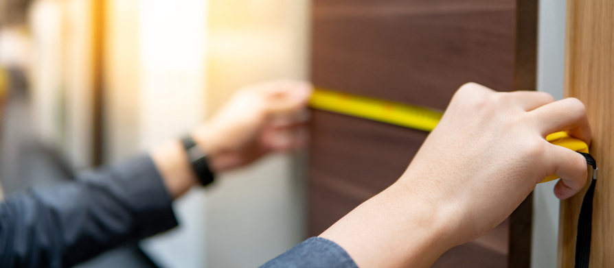 Man measuring a surface